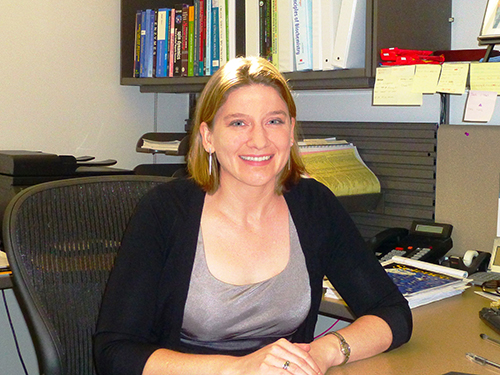 Prof. Bethany Buck-Koehntop in her office