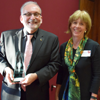 Joe Gardella receives his award from Cindy Burrows