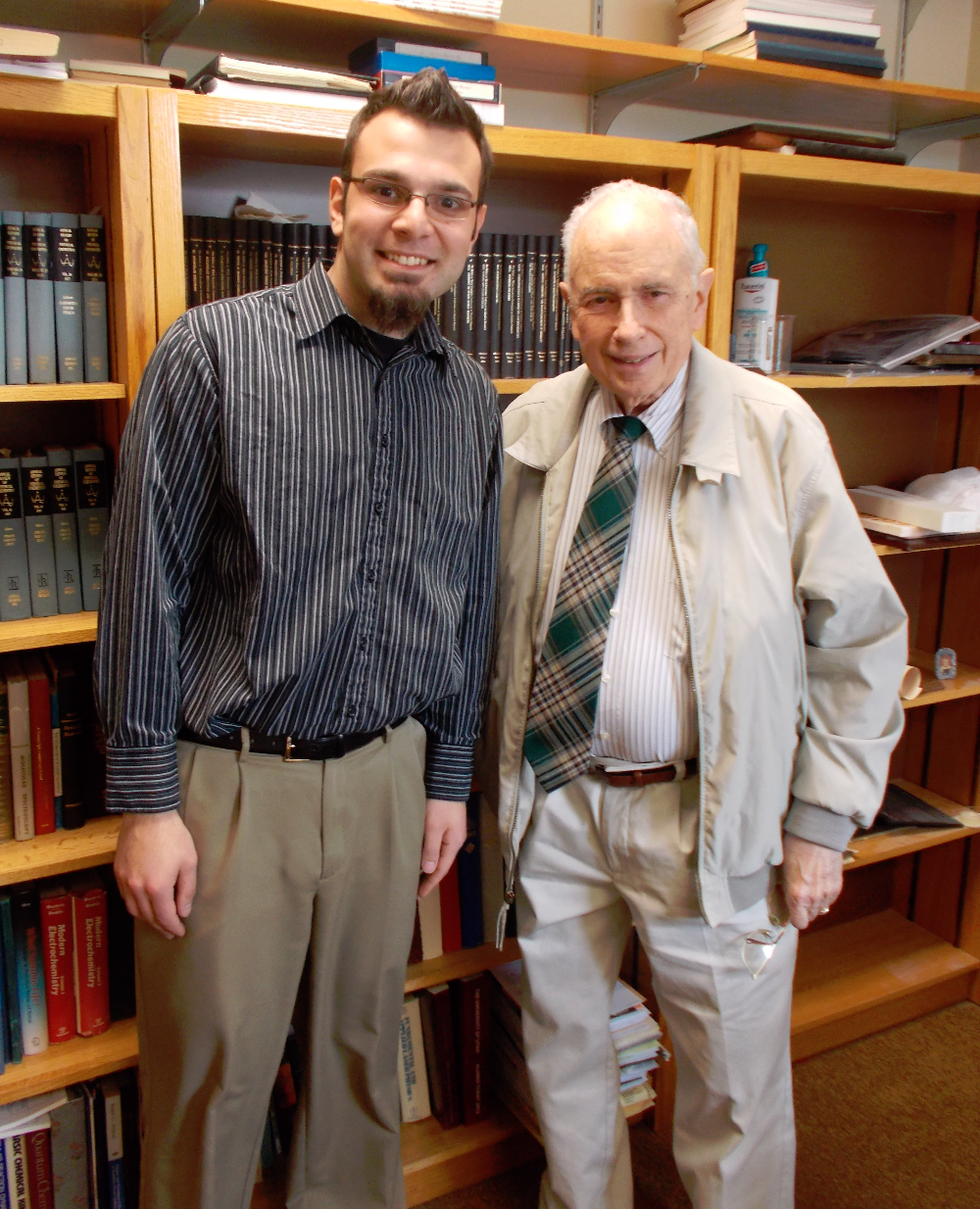 Prof. Ted Eyring stands with Levon Katsakhyan, the first Eyring Scholar, in 2013. 